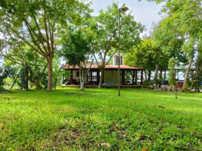 Casa Agua Bacalar / Naajil Ha